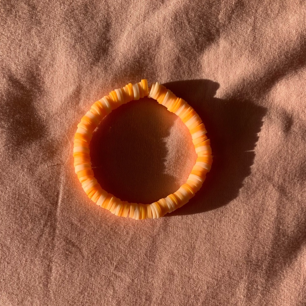 This bracelet is called sun kiss and the colors are orange and it was homemade!